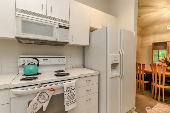 Kitchen leads to dining area