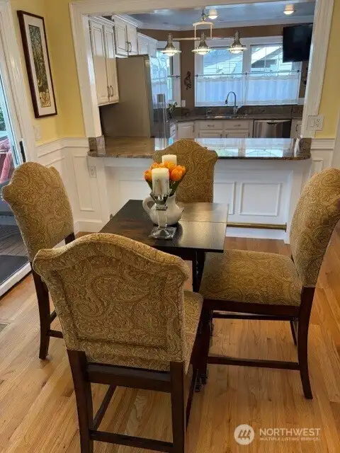 Beautiful flooring, dining room, and kitchen layout! Even a Breakfast bar! Beautiful flooring, dining room, and kitchen layout! Even a Breakfast bar!