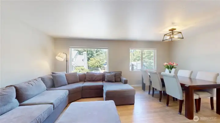 Located on the main level, natural light enhances the spacious feel of the living room. Located on the main level, natural light enhances the spacious feel of the living room.
