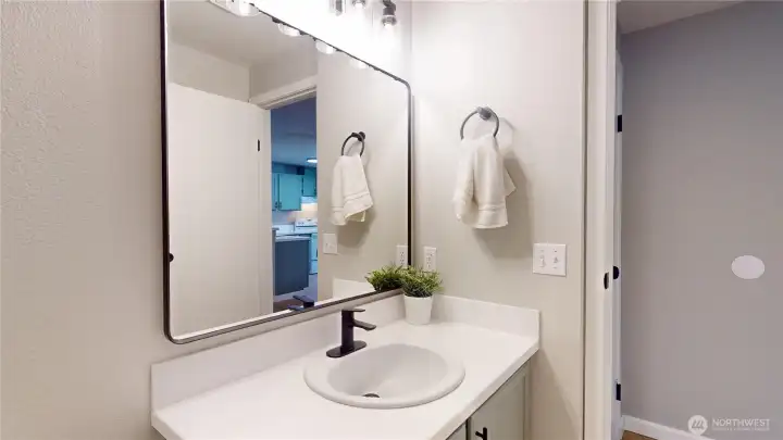 A convenient half bath is just off the secondary living area A convenient half bath is just off the secondary living area