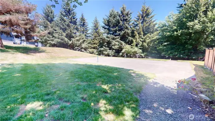 Once used as a tennis or pickle ball court, the community common area is vast to accomodate any gathering. Once used as a tennis or pickle ball court, the community common area is vast to accomodate any gathering.
