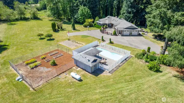 3660 sq ft daylight basement rambler with inground pool, fenced garden, hobby barn and shop all on 11.3 lovely acres. Very private setting.