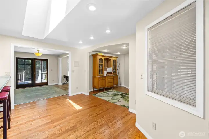 Entry from utility/mud room  French doors leading to deck