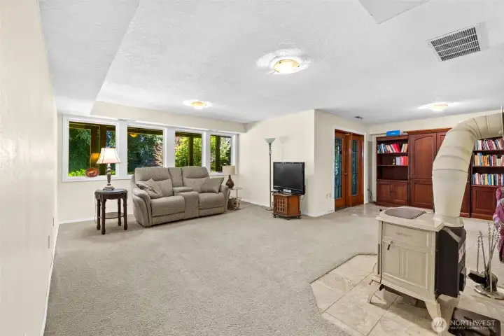 Lower level family room with woodstove