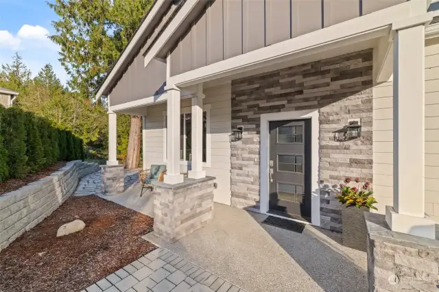 The curb appeal is undeniable, complete with a cozy front porch that exudes warmth and style.