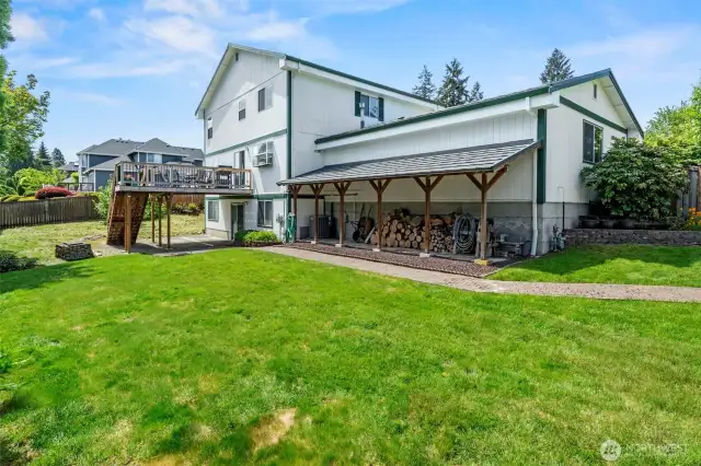 Great deck off the back of the house and plentiful undercover storage too!