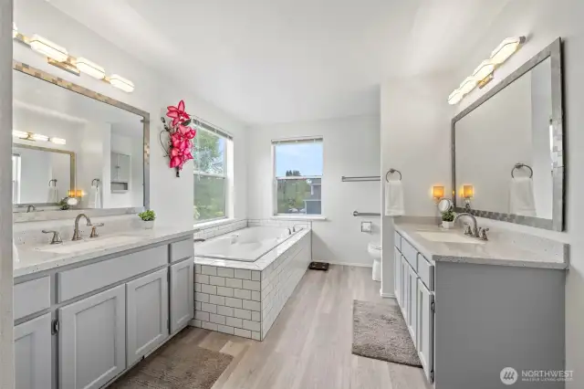 Master bathroom boast separate vanities, a large shower and soaking tub. Fully remodeled!