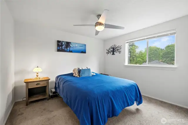 2nd bedroom upstairs. Each room is spacious and bright!