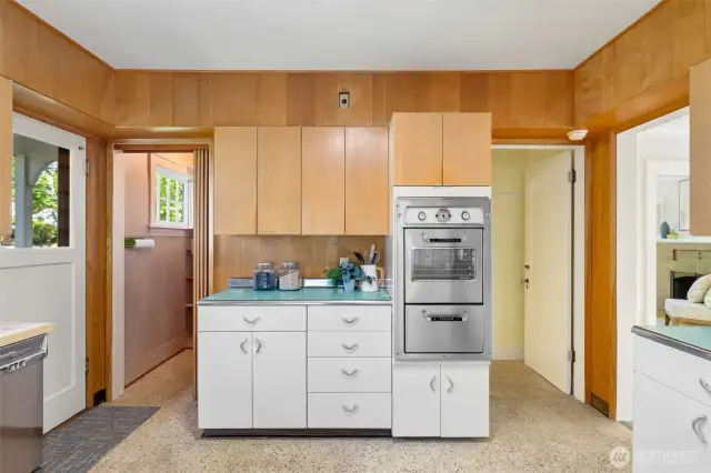 Walk-in pantry adjacent to the kitchen.