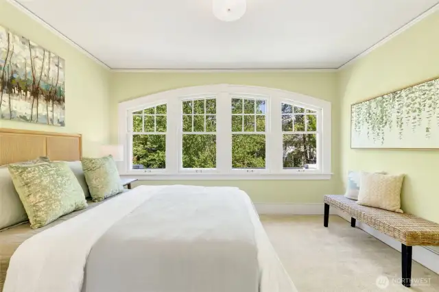 Largest of the three bedrooms with gorgeous window.