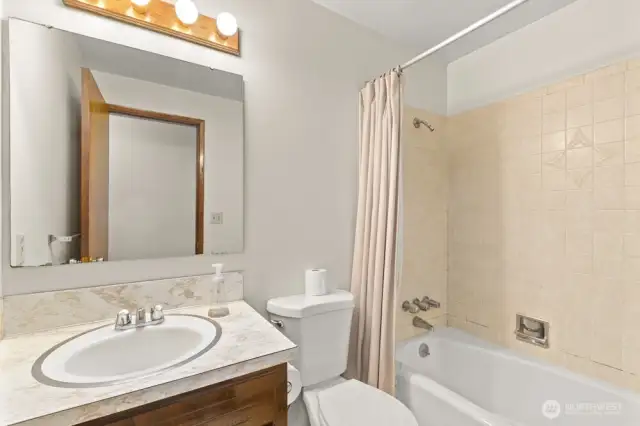 Solid bones and vintage charm—this full bath is just waiting for a stylish refresh and your favorite Pinterest board to come to life.