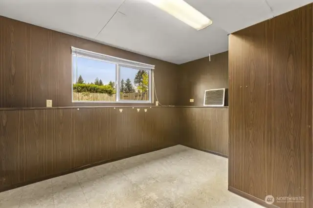 Need an office, craft room, or quiet creative corner? This lower-level den with natural light is full of potential—and it’s not afraid of a little DIY glow-up.