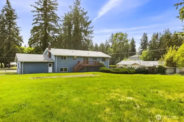 Handy access from the garage to the backyard—perfect for tackling lawn work, gardening, or quick project runs.
