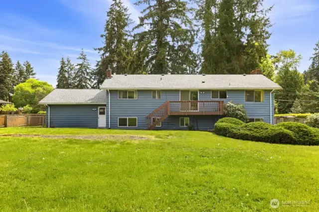 Sprawling yard? Check. Big deck? Check. All the space to garden, host, play, or build your dream outdoor setup? Double check.