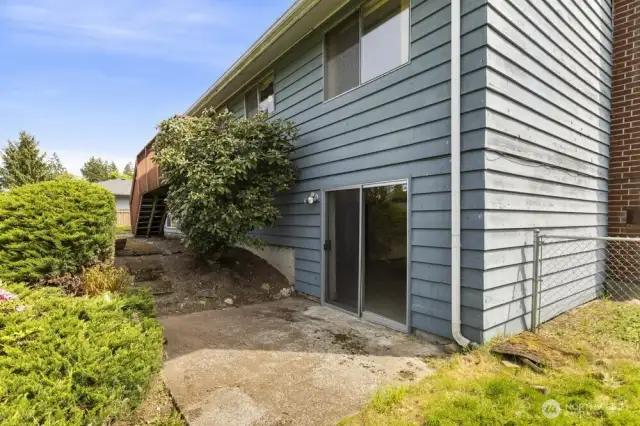 Easy walk-out access from the lower level makes this patio the perfect starting point for a future hot tub, fire pit, or cozy backyard retreat.