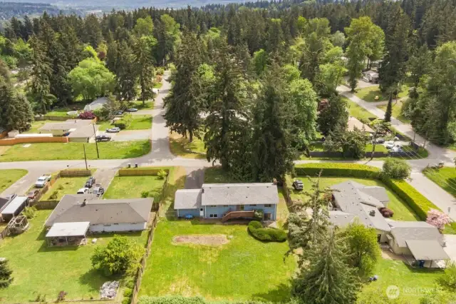 That yard! From above, you can really see the potential: garden beds, play space, future ADU? You’ve got options.