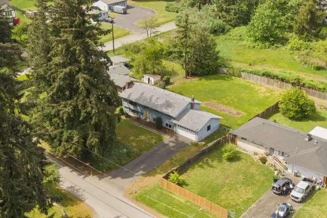 Room to roam and space to grow. This oversized lot gives you elbow room in all the best ways—plus a generous driveway and two-car garage.