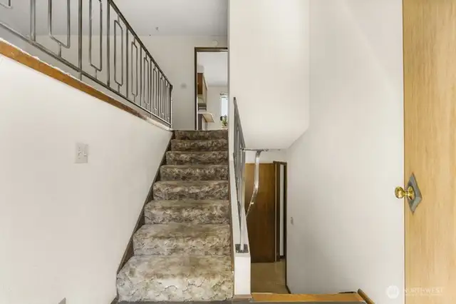 Split-entry style offers great separation of space—up for entertaining, down for movie nights, guests, or a home office.