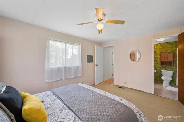 Spacious Primary Bedroom- Wake up to soft morning light in this peaceful primary bedroom. Plenty of room to relax, unwind, and dream about your next beach adventure or future build....