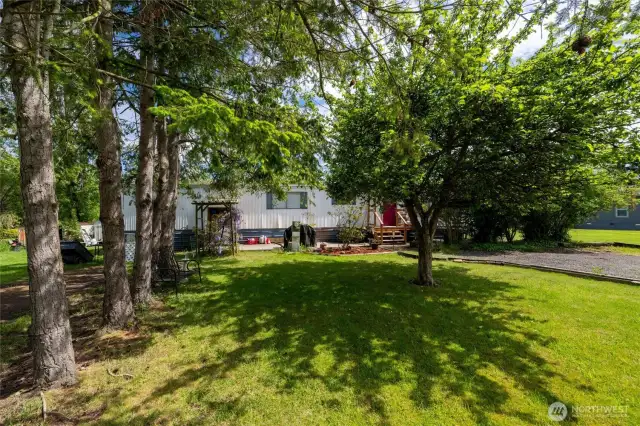 Oversized Lot with Lush Greenery- Enjoy over 1/3 of an acre of flat, usable land in the heart of Birch Bay. Shaded by mature trees and full of potential, this large lot is perfect for summer gatherings, future expansion, or simply enjoying the peaceful beach-town vibe....