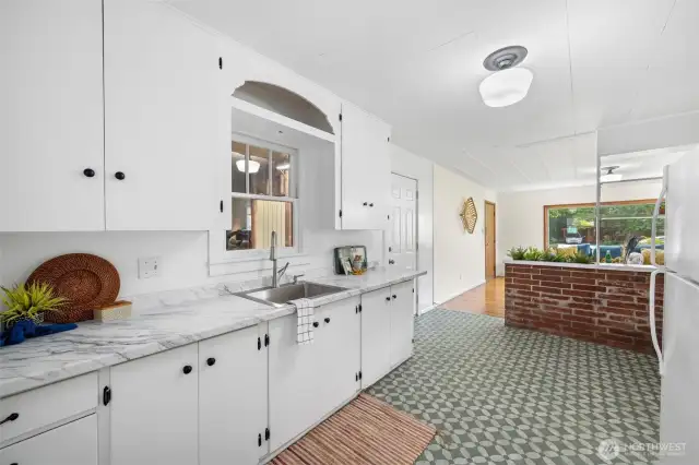 The galley kitchen is spacious, with lots of counterspace.