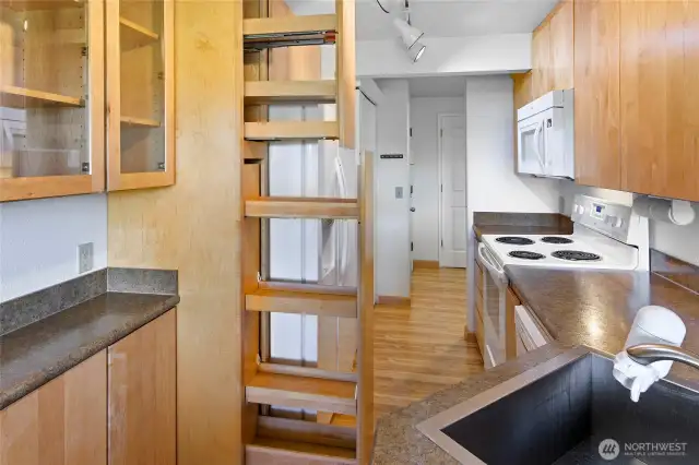 View of the kitchen.  Note the pull-out antry cabinet
