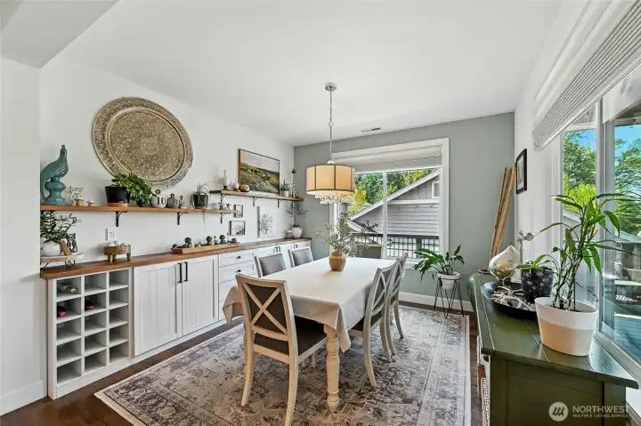 Beautiful built-in sideboard with decorative shelving in the dining room.