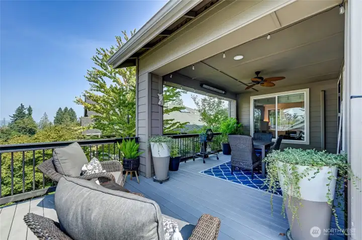 The extended deck runs the length of the house to take in the view and enjoy the sun.