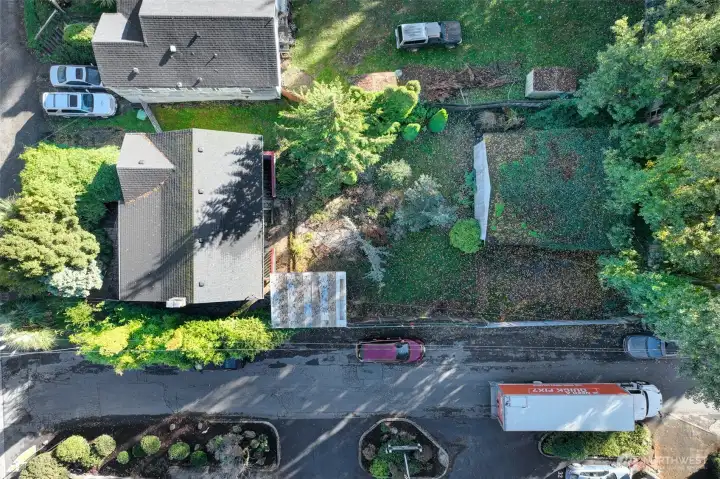 Bring your plans, developers and investors for this large  7540sqft (per KCR) corner lot with 1946 fixer home, yard and garage structure.