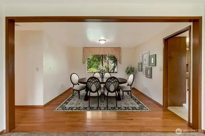 Enjoy memorable meals in the elegant formal dining room, ideal for holiday dinners, family gatherings, or intimate dinners with friends.  [This photo is virtually staged.]