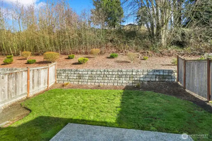 Private partially-fenced backyard and patio, perfect for outdoor entertaining!