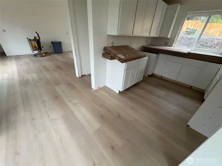 Second floor, kitchen and living