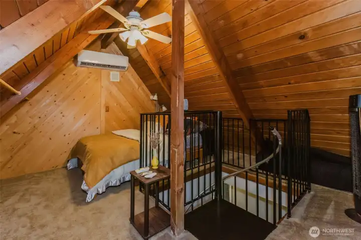 The loft provides two charming spaces—use one as a bedroom and the other as an office, or turn them into two separate sleeping hideaways.