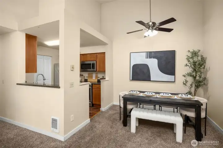 Full dining room next to kitchen
