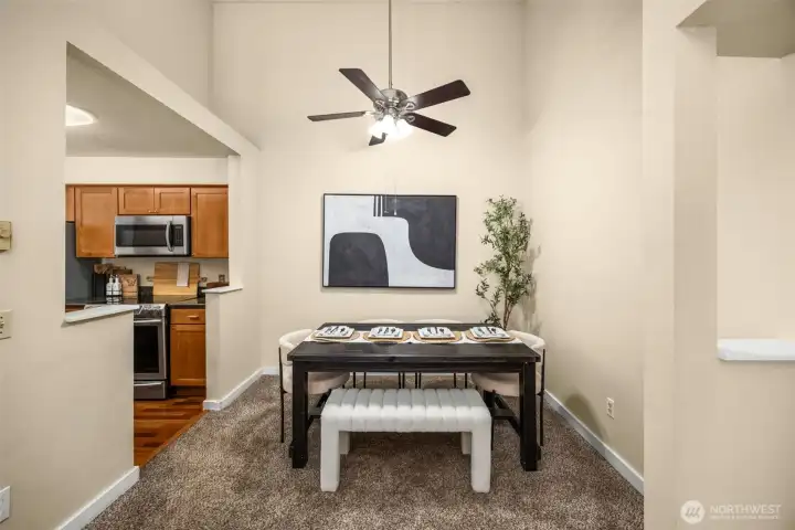 Full dining room next to kitchen