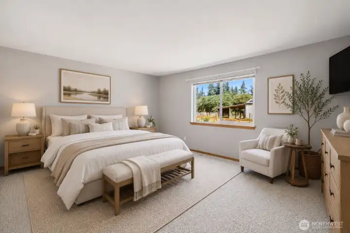 Virtually Staged: The primary suite is thoughtfully designed with custom California Closets and an ensuite bath. The bathroom features a six-foot soaking tub and a cable TV hookup, and all rooms in the home are wired for cable, including the primary bath. Virtually Staged: The primary suite is thoughtfully designed with custom California Closets and an ensuite bath. The bathroom features a six-foot soaking tub and a cable TV hookup, and all rooms in the home are wired for cable, including the primary bath.