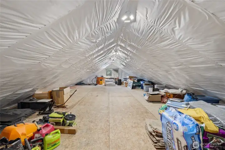 Huge insulated attic space in garage.