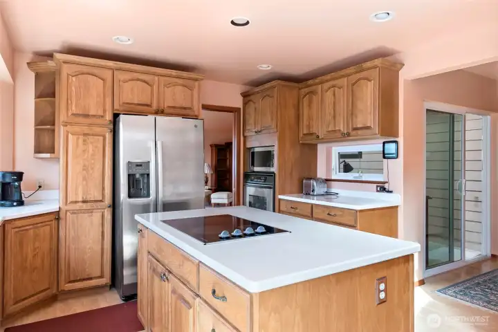 Plenty of storage & prep space, slider door to office/atrium