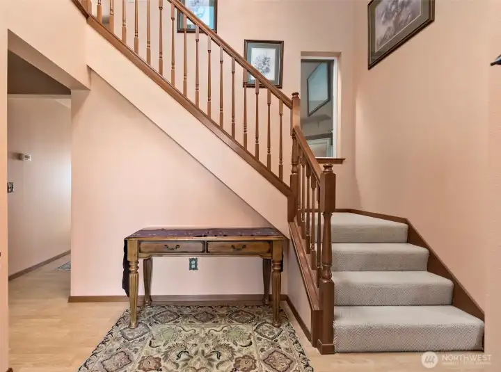 Soaring ceilings in the foyer make for an elegant entry