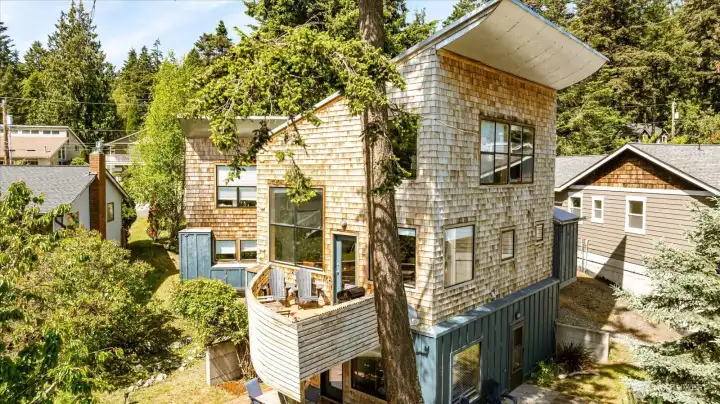 Noted Seattle Architect Sean Bell designed this beautiful home. It is currently a highly successful short term rental.