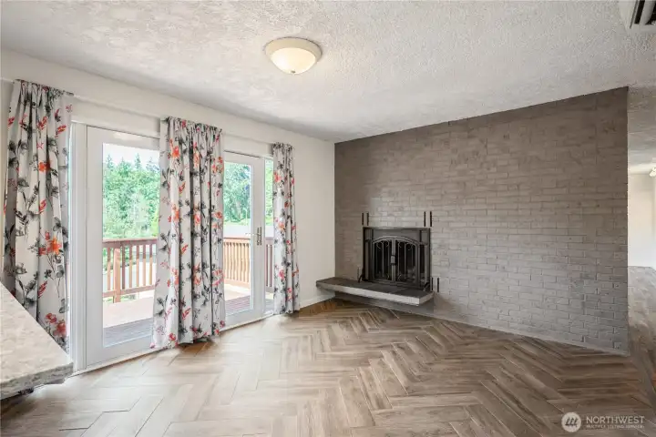 Dining Room w/FP & Fr Doors to Viewing Deck