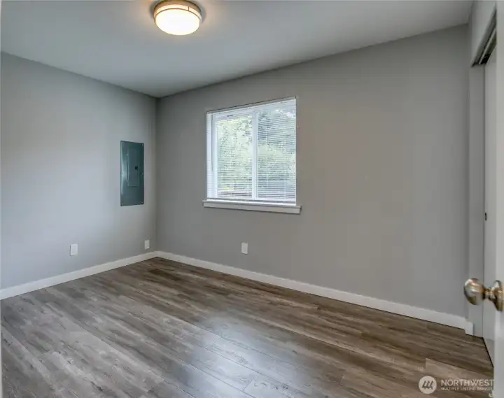 1st Bedroom looks out to the front yard.