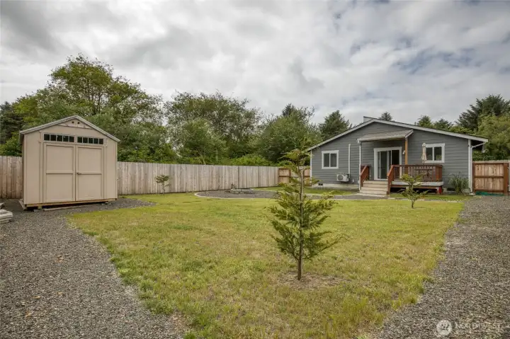 Sellers have cleared the backyard and brought the gravel driveway into the back with a gate wide enough for your RV.