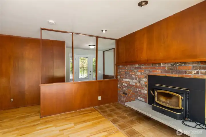 From the dining room, looking back toward the light-filled entryway