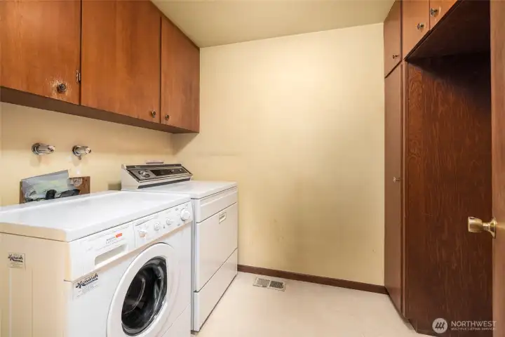 separate laundry room in hall