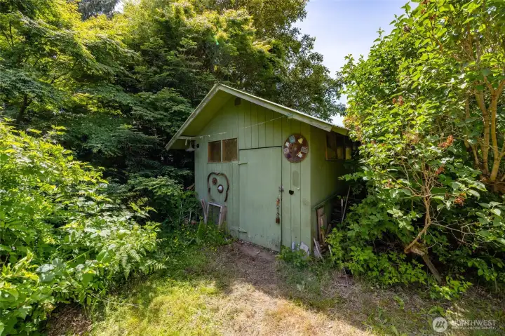 A workshop tucked in the among the bushes