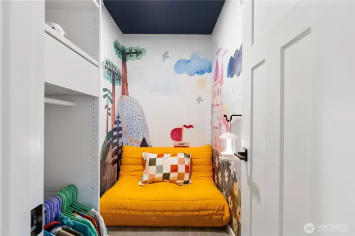 Cozy closet showcases creative custom shelving or storage opportunities, crisp trim, and neutral paint colors. Cozy closet showcases creative custom shelving or storage opportunities, crisp trim, and neutral paint colors.