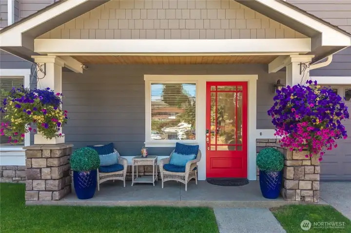 Enjoy a drink at the beautiful covered front porch.