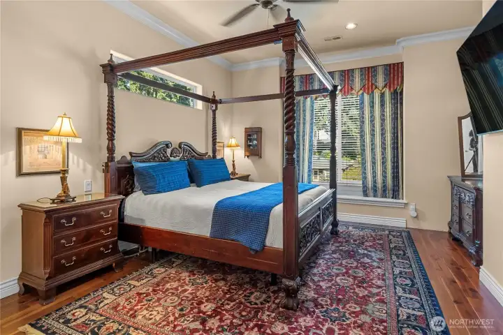 Massive primary bedroom  with elegant thoughtful touches e.g. built in spaces to fit your dressers without cluttering the flow of the room