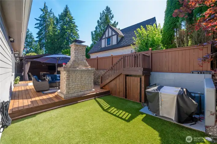 Astro turf keeps this backyard looking great in all seasons with very little to no maintenance!